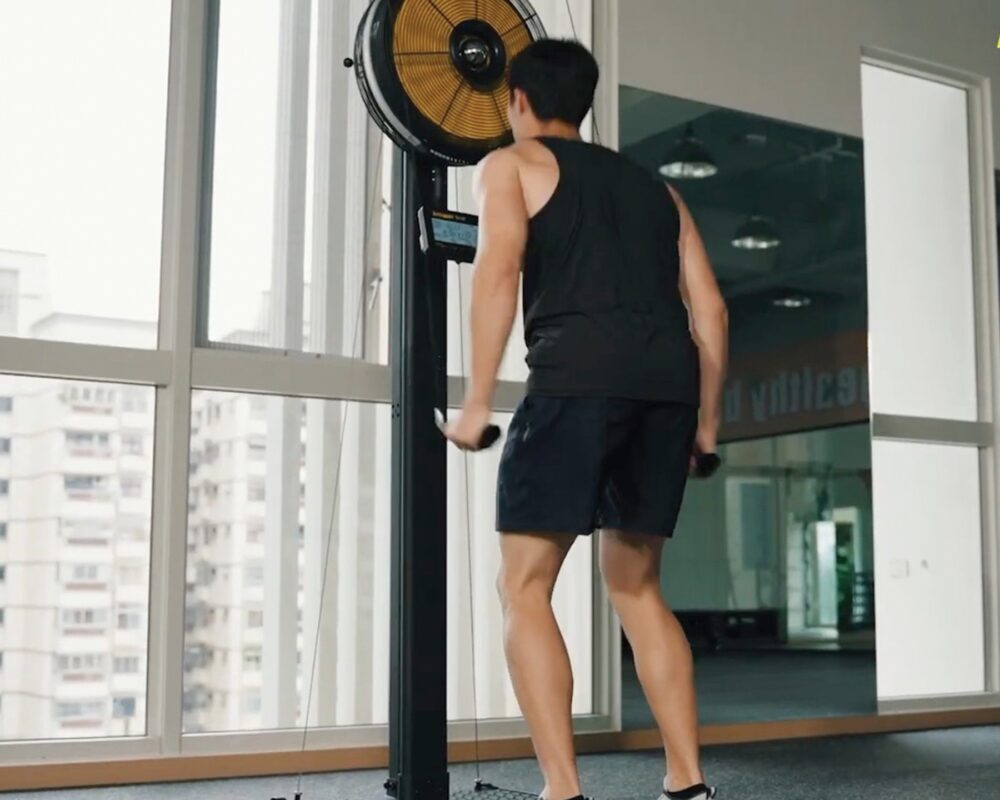 Person exercising on ski machine heavy duty, commercial grade like Hyrox Training