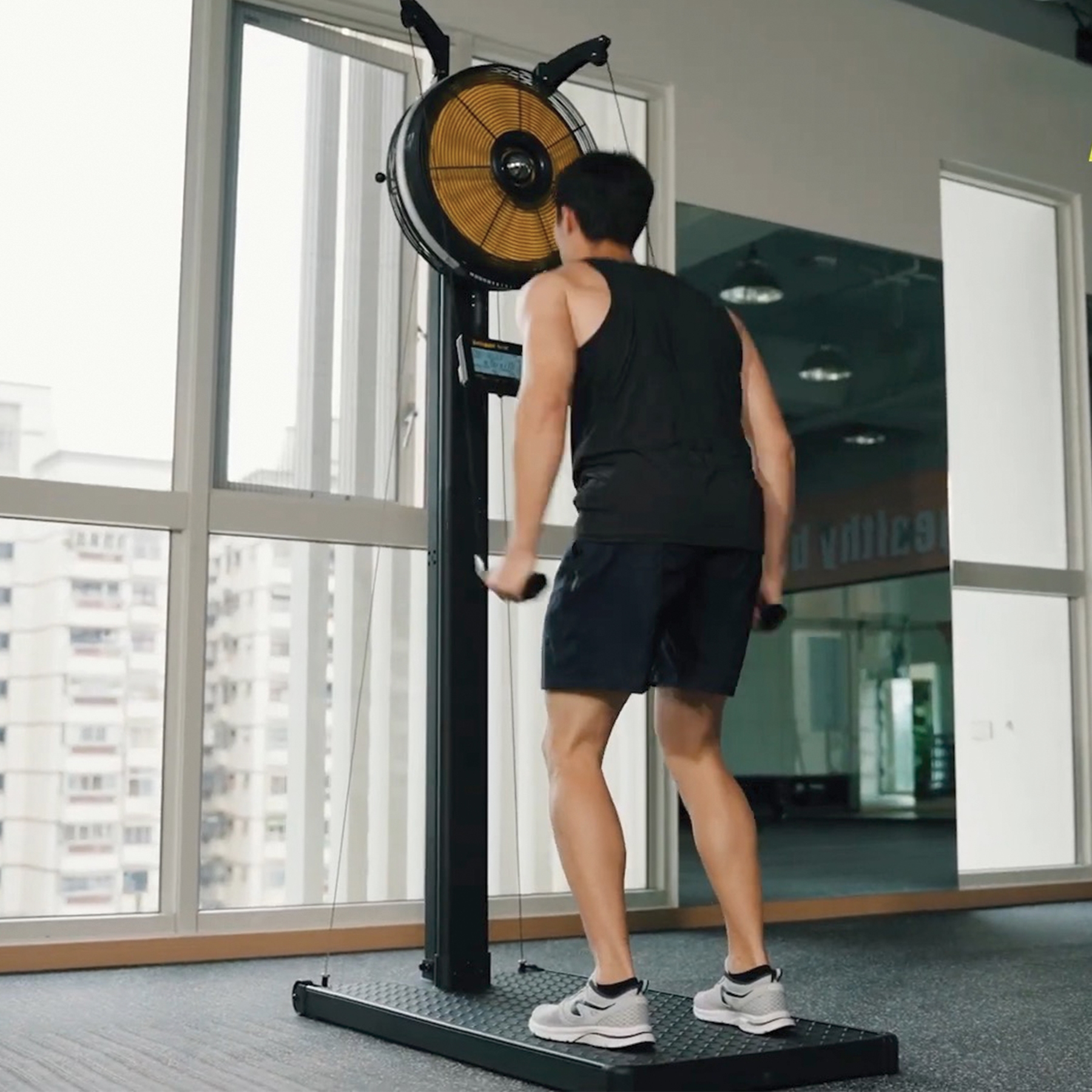 Person exercising on ski machine heavy duty, commercial grade like Hyrox Training