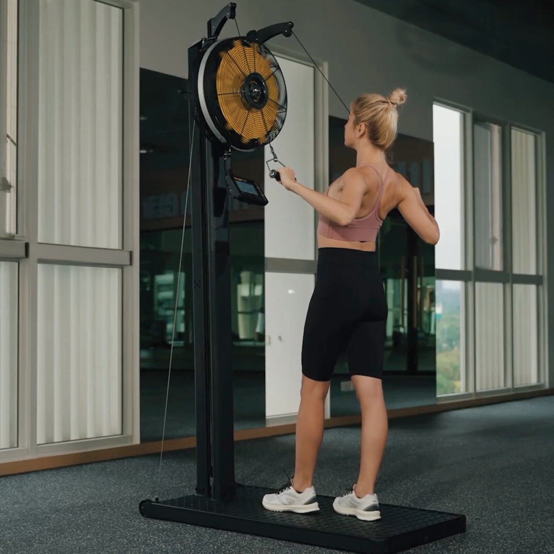 Person exercising on ski machine heavy duty, commercial grade like Hyrox Training upper position 3 position adjustable